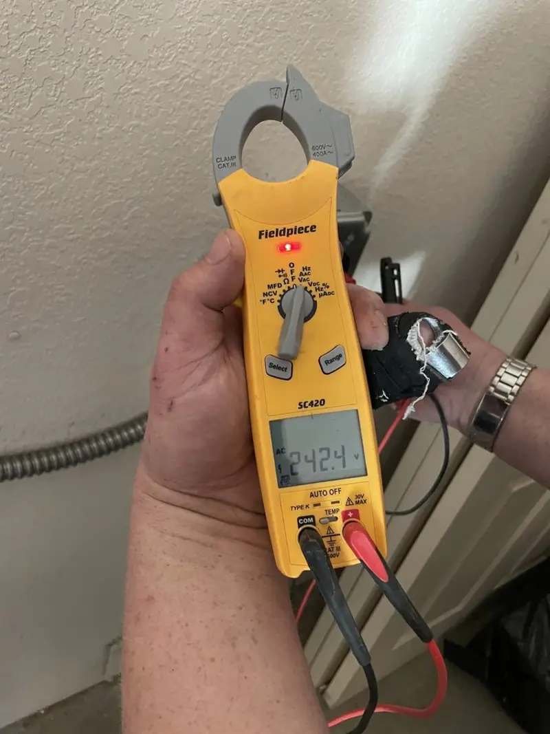 Voltage testing with clamp meter during Circuit Breaker Repair in Mauldin